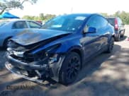 ✅ 2022 Tesla Model Y Long Range • VIN: 7SAYGDEE5NF314085 • Lot: 42233275. Wystawiony na IAAI z przebiegiem 30 024 mil. Bezpłatny archiwum sprzedaży aukcyjnych z USA i szczegółowy raport historii pojazdu na DreamBid. Zdjęcie 2.