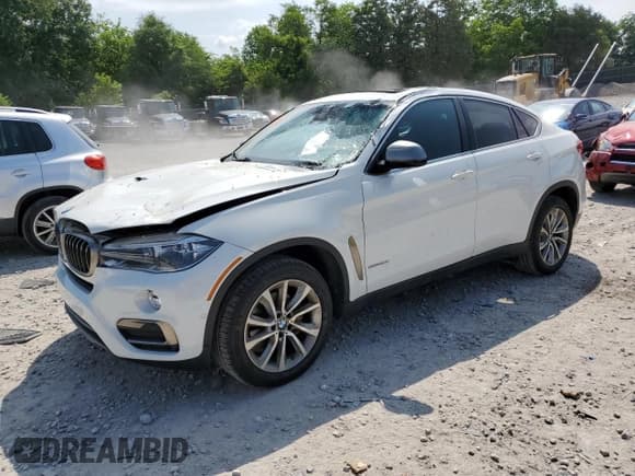✅ 2018 BMW X6 sDrive35i • VIN: 5UXKU0C54J0G69797 • Lot: 59867525. Listed on Copart with 95,049 mi. Free auction sales archive from the USA and detailed vehicle history report at DreamBid. Image 1.