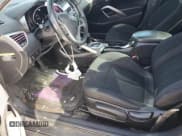 ✅ 2013 Hyundai Veloster w/Gray Int • VIN: KMHTC6AD3DU136853 • Lot: 56208614. Wystawiony na Copart z przebiegiem 154 440 mil. Bezpłatny archiwum sprzedaży aukcyjnych z USA i szczegółowy raport historii pojazdu na DreamBid. Zdjęcie 7.