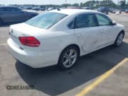 ✅ 2014 Volkswagen Passat SE • VIN: 1VWBS7A35EC088504 • Лот: 42312048. Опубликован ранее на IAAI с пробегом 98 057 миль. Бесплатный доступ к архиву аукционных продаж из США и подробный отчёт об истории автомобиля на DreamBid. Изображение 4.