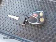 ✅ 2004 Chevrolet Suburban LT • VIN: 1GNFK16Z64J215342 • Lot: 42799214. Listed on IAAI with 222,894 mi. Free auction sales archive from the USA and detailed vehicle history report at DreamBid. Image 11.