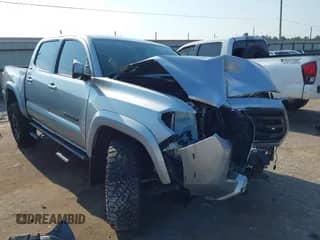 2022 Toyota Tacoma SR5 with VIN 3TMAZ5CN3NM194543, listed as a IAAI auction lot 43031222 with 21,800 mi miles and . Bid and sale history available at DreamBid. Image 1.