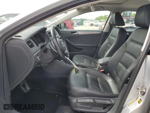 ✅ 2015 Volkswagen Jetta SE • VIN: 3VWD17AJ1FM311745 • Lot: 55936435. Listed on Copart with 79,819 mi. Free auction sales archive from the USA and detailed vehicle history report at DreamBid. Image 7.