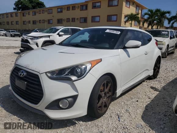 2013 Hyundai Veloster Turbo z VIN KMHTC6AE4DU123439, wystawiony jako Copart lot #70456765 z przebiegiem 135 212 mil mil oraz Czysty tytuł • Clean title. Historia ofert i sprzedaży dostępna na DreamBid. Obrazek 1.