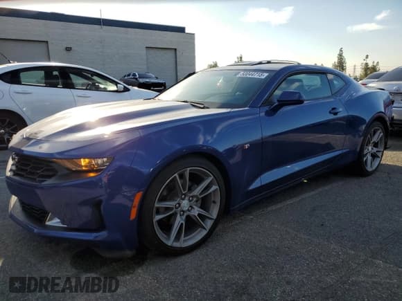 ✅ 2021 Chevrolet Camaro 1LS • VIN: 1G1FB1RX1M0142799 • Lot: 50044715. Listed on Copart with 42,861 mi. Free auction sales archive from the USA and detailed vehicle history report at DreamBid. Image 1.