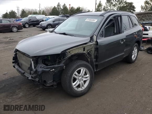 ✅ 2012 Hyundai Santa Fe GLS • VIN: 5XYZGDAB2CG104577 • Lot: 81955304. Listed on Copart with 99,407 mi. Free auction sales archive from the USA and detailed vehicle history report at DreamBid. Image 1.