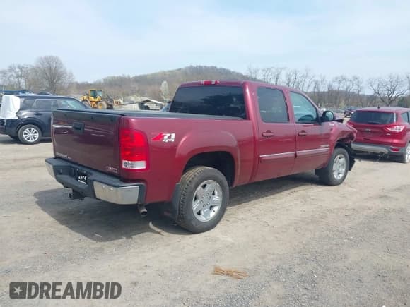 ✅ 2013 GMC Sierra 1500 SLT • VIN: 3GTP2WE72DG313117 • Lot: 42018370. Listed on IAAI with 133,892 mi. Free auction sales archive from the USA and detailed vehicle history report at DreamBid. Image 4.
