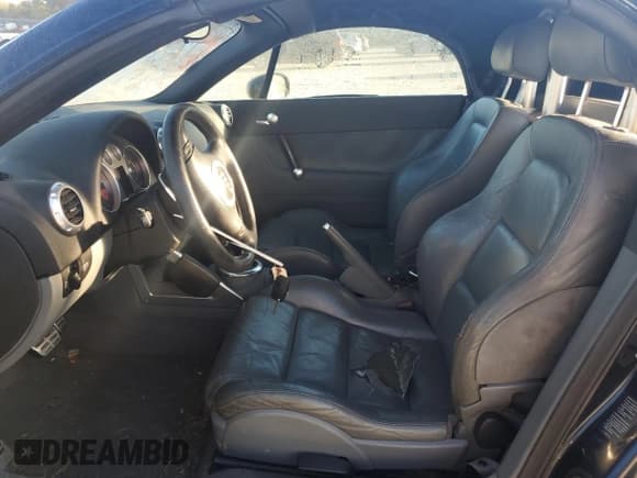 ✅ 2003 Audi TT • VIN: TRUTC28N431018585 • Lot: 76498354. Wystawiony na Copart z przebiegiem 125 601 mil. Bezpłatny archiwum sprzedaży aukcyjnych z USA i szczegółowy raport historii pojazdu na DreamBid. Zdjęcie 7.