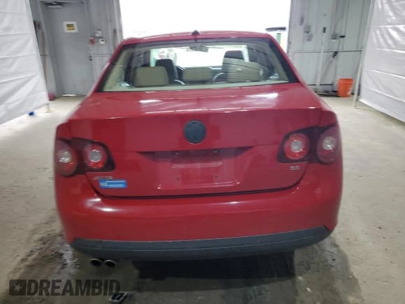 ✅ 2009 Volkswagen Jetta SE • VIN: 3VWRZ71K69M011873 • Lot: 52881525. Listed on Copart with 154,441 mi. Free auction sales archive from the USA and detailed vehicle history report at DreamBid. Image 6.