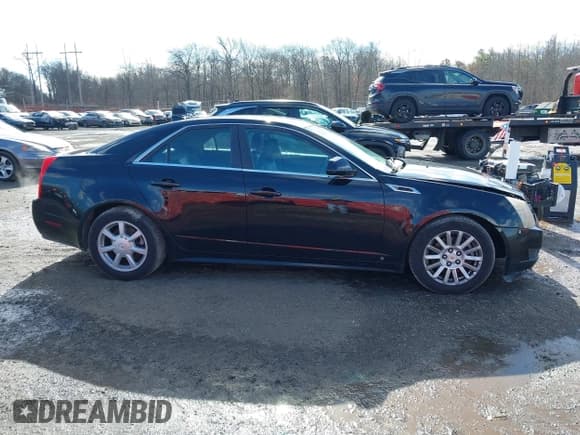 ✅ 2012 Cadillac CTS • VIN: 1G6DC5E5XC0144060 • Lot: 41596919. Listed on IAAI with 108,151 mi. Free auction sales archive from the USA and detailed vehicle history report at DreamBid. Image 13.