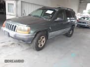 ✅ 2002 Jeep Grand Cherokee Laredo • VIN: 1J4GW48NX2C196495 • Lot: 42781267. Listed on IAAI with 209,655 mi. Free auction sales archive from the USA and detailed vehicle history report at DreamBid. Image 17.