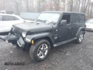 ✅ 2022 Jeep Wrangler Unlimited Sahara • VIN: 1C4HJXEN4NW251606 • Lot: 41443765. Listed on IAAI with 58,748 mi. Free auction sales archive from the USA and detailed vehicle history report at DreamBid. Image 18.