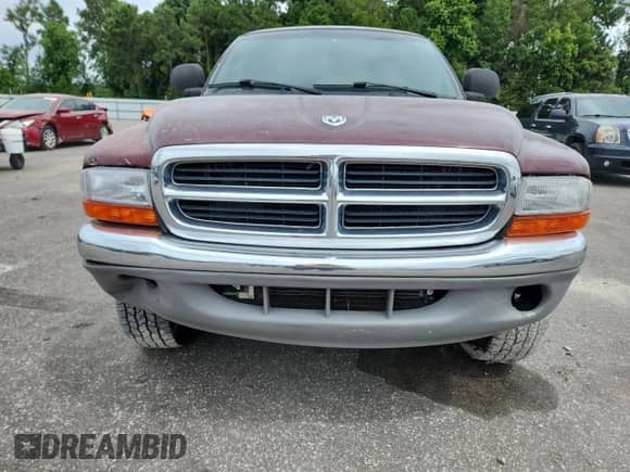 2000 Dodge Dakota Sport z VIN 1B7GG26N5YS650791, wystawiony jako Copart lot #63601765 z przebiegiem 80 841 mil mil oraz Szkoda całkowita • Salvage title. Historia ofert i sprzedaży dostępna na DreamBid. Obrazek 5.