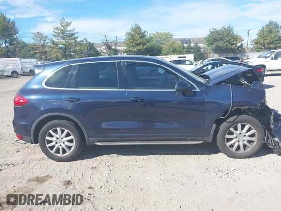 ✅ 2012 Porsche Cayenne • VIN: WP1AA2A2XCLA00862 • Lot: 43470943. Listed on IAAI with 94,854 mi. Free auction sales archive from the USA and detailed vehicle history report at DreamBid. Image 14.