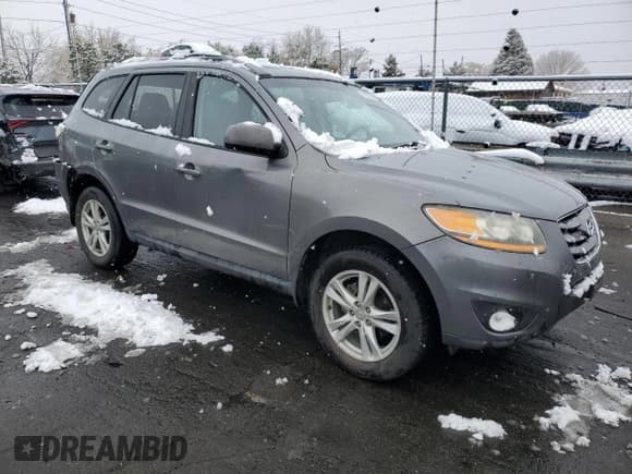 ✅ 2010 Hyundai Santa Fe SE • VIN: 5NMSH4AG7AH401115 • Lot: 79569044. Listed on Copart with 107,166 mi. Free auction sales archive from the USA and detailed vehicle history report at DreamBid. Image 4.