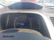 ✅ 2010 Honda Civic EX-L • VIN: 2HGFG1B98AH533459 • Lot: 42375820. Listed on IAAI with 154,088 mi. Free auction sales archive from the USA and detailed vehicle history report at DreamBid. Image 7.