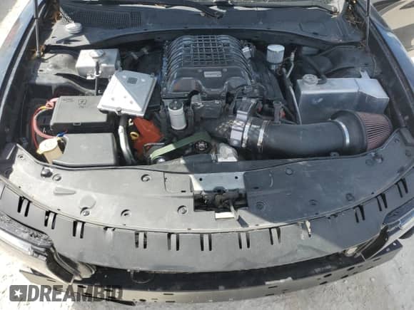 2015 Dodge Charger SRT Hellcat z VIN 2C3CDXL91FH795556, wystawiony jako Copart lot #77477774 z przebiegiem Nie podano mil oraz Szkoda całkowita • Salvage title. Historia ofert i sprzedaży dostępna na DreamBid. Obrazek 11.