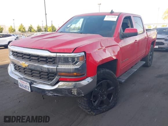 ✅ 2018 Chevrolet Silverado 1500 LT • VIN: 3GCUKREC4JG611312 • Лот: 43121610. Опубликован ранее на IAAI с пробегом 32 147 миль. Бесплатный доступ к архиву аукционных продаж из США и подробный отчёт об истории автомобиля на DreamBid. Изображение 2.
