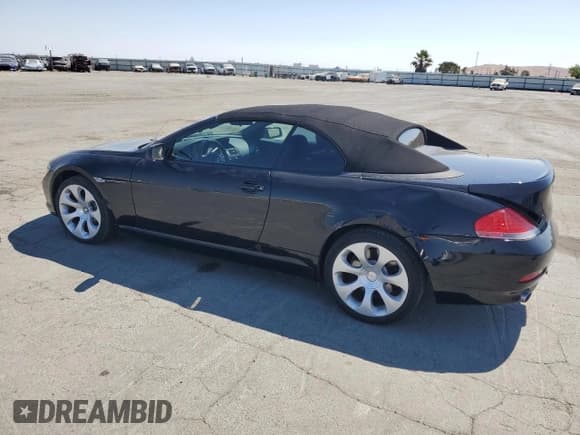 ✅ 2006 BMW 6 Series 650Ci • VIN: WBAEK13496CN78400 • Lot: 64634235. Wystawiony na Copart z przebiegiem 129 891 mil. Bezpłatny archiwum sprzedaży aukcyjnych z USA i szczegółowy raport historii pojazdu na DreamBid. Zdjęcie 2.