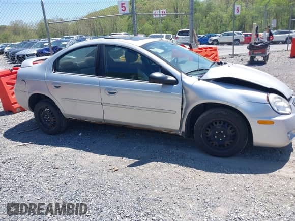 2004 Dodge Neon SXT z VIN 1B3ES56C44D580657, wystawiony jako IAAI lot #42137299 z przebiegiem 138 918 mil mil oraz . Historia ofert i sprzedaży dostępna na DreamBid. Obrazek 13.