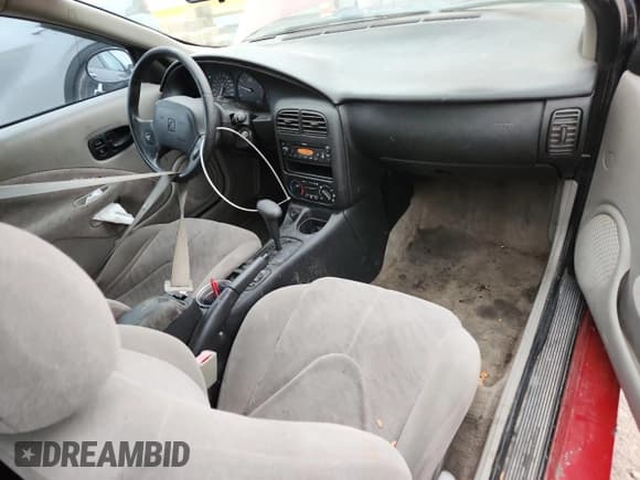 ✅ 2001 Saturn SC • VIN: 1G8ZY12701Z225347 • Лот: 90816705. Опубликован ранее на Copart с пробегом 148 414 миль. Бесплатный доступ к архиву аукционных продаж из США и подробный отчёт об истории автомобиля на DreamBid. Изображение 8.