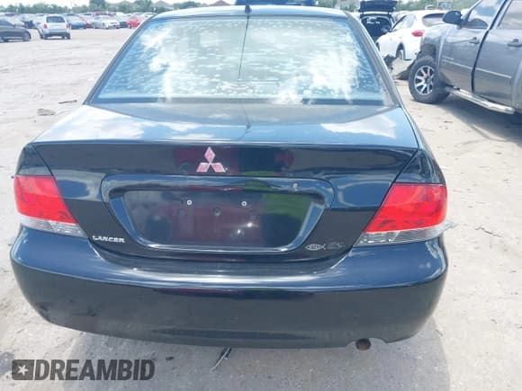 ✅ 2004 Mitsubishi Lancer ES • VIN: JA3AJ26E04U023128 • Lot: 42804725. Listed on IAAI with 167,183 mi. Free auction sales archive from the USA and detailed vehicle history report at DreamBid. Image 16.