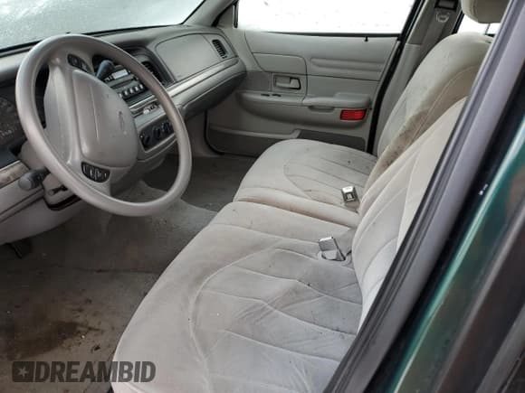 ✅ 2000 Ford Crown Victoria • VIN: 2FAFP73WXYX157746 • Lot: 82748804. Wystawiony na Copart z przebiegiem 56 820 mil. Bezpłatny archiwum sprzedaży aukcyjnych z USA i szczegółowy raport historii pojazdu na DreamBid. Zdjęcie 7.