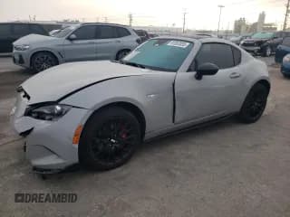 ✅ 2024 Mazda MX-5 Miata Club • VIN: JM1NDAL71R0607675 • Lot: 91052035. Wystawiony na Copart z przebiegiem 11 642 mil. Bezpłatny archiwum sprzedaży aukcyjnych z USA i szczegółowy raport historii pojazdu na DreamBid. Zdjęcie 1.