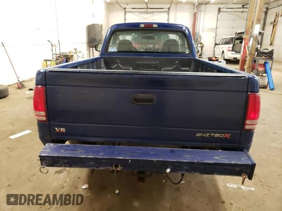 2002 Dodge Dakota Sport z VIN 1B7FL36X32S619139, wystawiony jako Copart lot #81567594 z przebiegiem 160 429 mil mil oraz Szkoda całkowita • Salvage title. Historia ofert i sprzedaży dostępna na DreamBid. Obrazek 6.