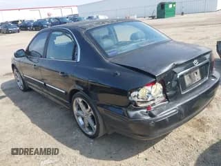 ✅ 2002 Hyundai Sonata GLS • VIN: KMHWF35HX2A557404 • Lot: 42869421. Listed on IAAI with 242,947 mi. Free auction sales archive from the USA and detailed vehicle history report at DreamBid. Image 3.