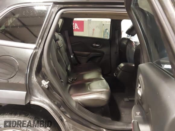 ✅ 2015 Jeep Cherokee Trailhawk • VIN: 1C4PJMBS7FW650340 • Lot: 43755791. Listed on IAAI with 129,855 mi. Free auction sales archive from the USA and detailed vehicle history report at DreamBid. Image 8.