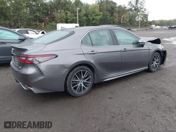 ✅ 2022 Toyota Camry Hybrid SE • VIN: 4T1G31AK9NU593171 • Лот: 43394912. Опубликован ранее на IAAI с пробегом 175 318 миль. Бесплатный доступ к архиву аукционных продаж из США и подробный отчёт об истории автомобиля на DreamBid. Изображение 4.