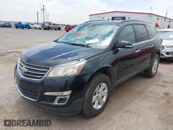 ✅ 2014 Chevrolet Traverse LT • VIN: 1GNKRHKD1EJ318053 • Lot: 42562508. Listed on IAAI with 93,544 mi. Free auction sales archive from the USA and detailed vehicle history report at DreamBid. Image 2.