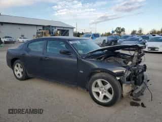 2008 Dodge Charger с VIN 2B3KA43G58H287835, выставлен на аукционе Copart как лот 76990134 с пробегом 140 951 миль миль и Списание • Salvage title. История ставок и продаж доступна на DreamBid. Изображение 4.