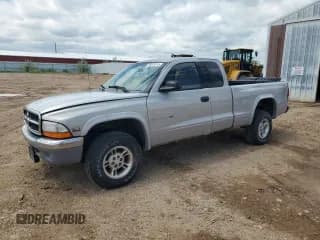 ✅ 1999 Dodge Dakota SLT • VIN: 1B7GG22X0XS268996 • Lot: 58541515. Wystawiony na Copart z przebiegiem 189 899 mil. Bezpłatny archiwum sprzedaży aukcyjnych z USA i szczegółowy raport historii pojazdu na DreamBid. Zdjęcie 1.