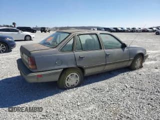 ✅ 1992 Pontiac Lemans • VIN: KL2TN5467NB324622 • Lot: 47321325. Wystawiony na Copart z przebiegiem 173 408 mil. Bezpłatny archiwum sprzedaży aukcyjnych z USA i szczegółowy raport historii pojazdu na DreamBid. Zdjęcie 3.