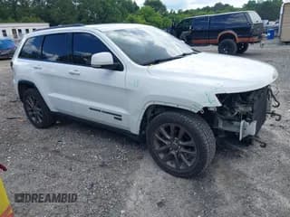 ✅ 2016 Jeep Grand Cherokee Limited • VIN: 1C4RJEBG1GC392636 • Lot: 42531197. Listed on IAAI with 128,735 mi. Free auction sales archive from the USA and detailed vehicle history report at DreamBid. Image 1.