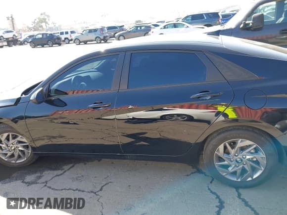 ✅ 2024 Hyundai Elantra SEL • VIN: KMHLM4DG4RU804349 • Lot: 43345019. Listed on IAAI with 35,484 mi. Free auction sales archive from the USA and detailed vehicle history report at DreamBid. Image 14.