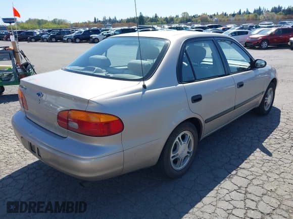 ✅ 2002 Chevrolet Prizm • VIN: 1Y1SK52892Z412379 • Lot: 41985266. Listed on IAAI with 203,824 mi. Free auction sales archive from the USA and detailed vehicle history report at DreamBid. Image 4.