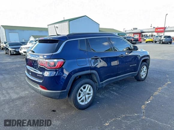✅ 2019 Jeep Compass Sport • VIN: 3C4NJDAB3KT601077 • Lot: 94959485. Listed on Copart with 105,781 mi. Free auction sales archive from the USA and detailed vehicle history report at DreamBid. Image 4.
