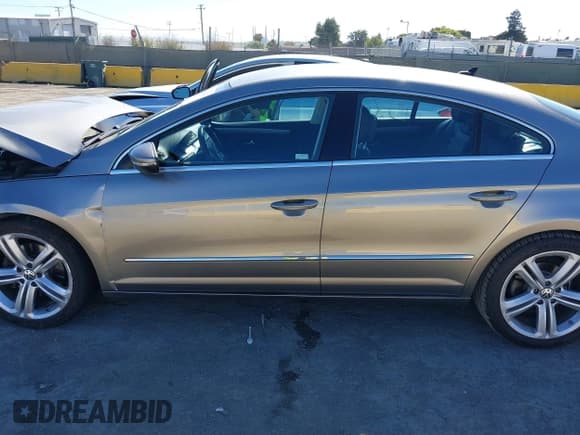 ✅ 2013 Volkswagen CC R-Line • VIN: WVWBP7AN5DE516953 • Lot: 42920630. Listed on IAAI with 107,428 mi. Free auction sales archive from the USA and detailed vehicle history report at DreamBid. Image 14.