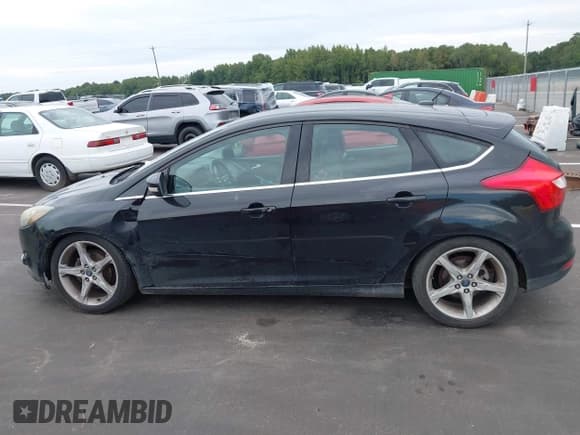✅ 2014 Ford Focus Titanium • VIN: 1FADP3N27EL114825 • Lot: 43217005. Listed on IAAI with 148,002 mi. Free auction sales archive from the USA and detailed vehicle history report at DreamBid. Image 14.