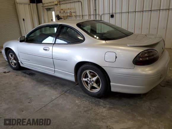 ✅ 2001 Pontiac Grand Prix GT • VIN: 1G2WP12K61F175091 • Lot: 71577405. Listed on Copart with 147,405 mi. Free auction sales archive from the USA and detailed vehicle history report at DreamBid. Image 2.