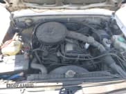 ✅ 1986 Nissan 720 • VIN: JN6ND06S6GW109456 • Lot: 42944828. Wystawiony na IAAI z przebiegiem 137 049 mil. Bezpłatny archiwum sprzedaży aukcyjnych z USA i szczegółowy raport historii pojazdu na DreamBid. Zdjęcie 10.