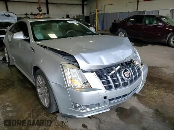 ✅ 2012 Cadillac CTS Performance • VIN: 1G6DL1E32C0107317 • Lot: 67079305. Listed on Copart with 77,130 mi. Free auction sales archive from the USA and detailed vehicle history report at DreamBid. Image 13.