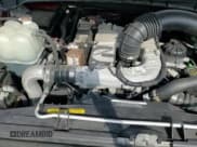 ✅ 2018 Nissan Titan Platinum Reserve • VIN: 1N6BA1F49JN520687 • Lot: 69172075. Wystawiony na Copart z przebiegiem 111 557 mil. Bezpłatny archiwum sprzedaży aukcyjnych z USA i szczegółowy raport historii pojazdu na DreamBid. Zdjęcie 14.