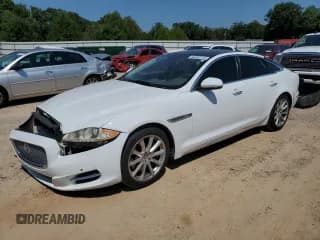 ✅ 2013 Jaguar XJ • VIN: SAJWA1C7XD8V55164 • Лот: 80382115. Опубликован ранее на Copart с пробегом 69 465 миль. Бесплатный доступ к архиву аукционных продаж из США и подробный отчёт об истории автомобиля на DreamBid. Изображение 1.