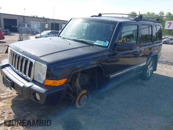 ✅ 2010 Jeep Commander Sport • VIN: 1J4RG4GK2AC118126 • Lot: 42345486. Listed on IAAI with 154,376 mi. Free auction sales archive from the USA and detailed vehicle history report at DreamBid. Image 18.