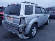 ✅ 2010 Ford Escape XLT • VIN: 1FMCU0D72AKD17806 • Lot: 43708410. Listed on IAAI with 102,965 mi. Free auction sales archive from the USA and detailed vehicle history report at DreamBid. Image 4.