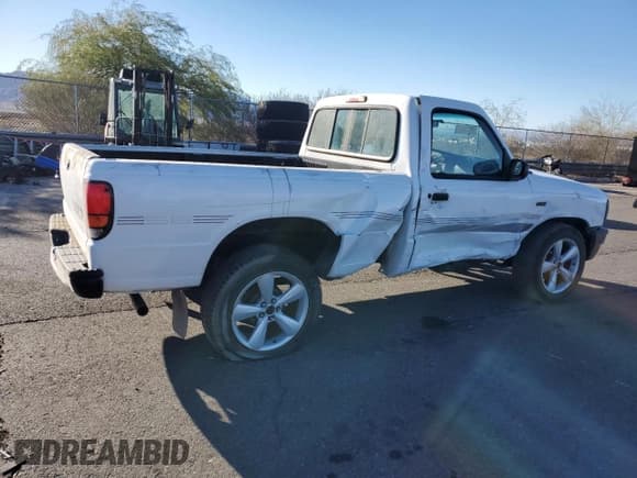 ✅ 1995 Mazda B-Series • VIN: 4F4CR12A6STM05562 • Lot: 53582395. Listed on Copart with 154,322 mi. Free auction sales archive from the USA and detailed vehicle history report at DreamBid. Image 3.